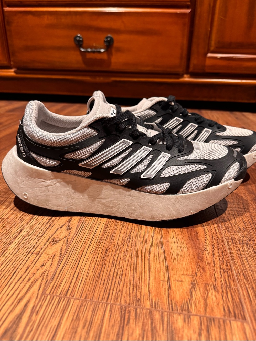 Adidas unisex Adizero Sneakers in Gray and Black. Swirlfoam tech soles